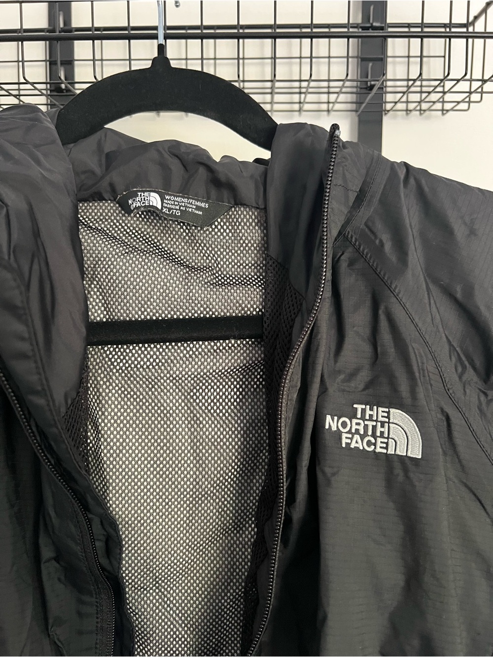 The North Face Black Hooded Lightweight Rain Jacket with White Logo - Picture 3 of 4